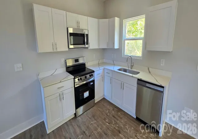 Photo 3 of Multi family home for sale at 1117 Tennyson St, Charlotte, NC 28208 | MLS# 4434804 | Listing updated on 2026-10-16