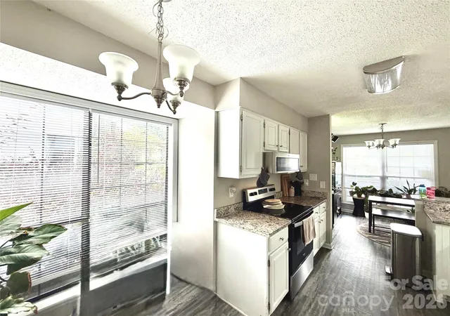 Photo 4 of Condo for sale at 5867 Harris Grv Ln, Charlotte, NC 28212 | MLS# 4434823 | Listing updated on 2026-10-15