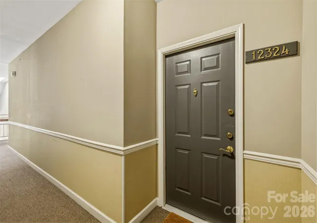 Listing Photo 1 - Condo for sale in building located at 12324 Copper Mountain Blvd, Charlotte, NC 28277