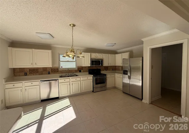 Photo 1 of Single family home for sale at 6807 Wandering Crk Dr, Charlotte, NC 28216 | MLS# 4435743 | Listing updated on 2026-10-30