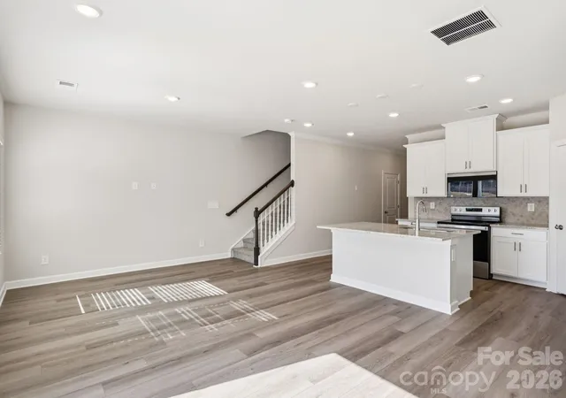 Photo 2 of Townhouse for sale at 8013 Hidden Springs Dr, Charlotte, NC 28216 | MLS# 4436050 | Listing updated on 2026-10-27