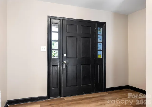 Photo 2 of Single family home for sale at 1100 Dark Wood Ct, Matthews, NC 28105 | MLS# 4436676 | Listing updated on 2026-10-29