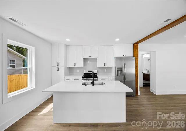 Photo 2 of Single family home for sale at 2942 Reid Ave, Charlotte, NC 28208 | MLS# 4437077 | Listing updated on 2026-10-28