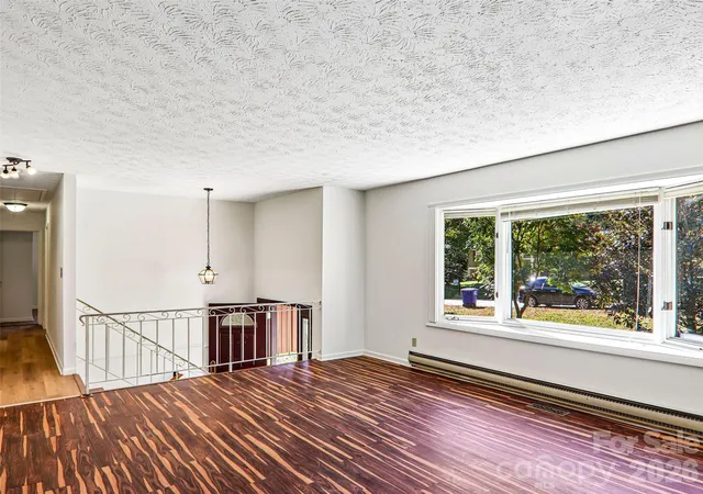 Photo 4 of Single family home for sale at 331 Woody Ln, Asheville, NC 28804 | MLS# 4437174 | Listing updated on 2026-10-30