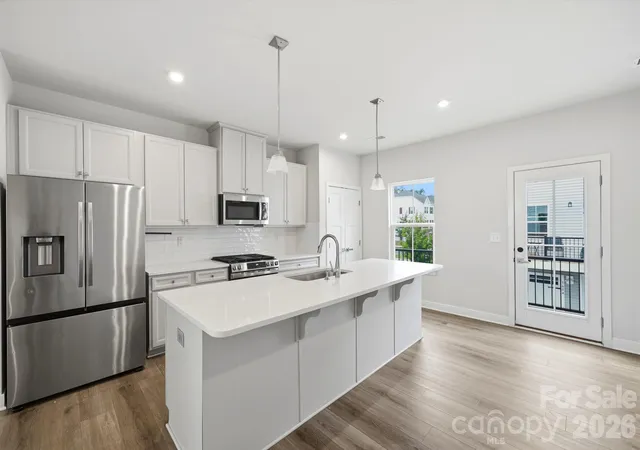 Photo 2 of Townhouse for sale at 9302 Mallard Mills Dr, Charlotte, NC 28262 | MLS# 4437307 | Listing updated on 2026-10-24