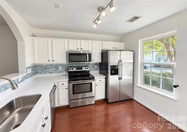 Photo 3 of Townhouse for sale at 4212 Glenlea Cmns Dr, Charlotte, NC 28216 | MLS# 4438881 | Listing updated on 2026-10-28