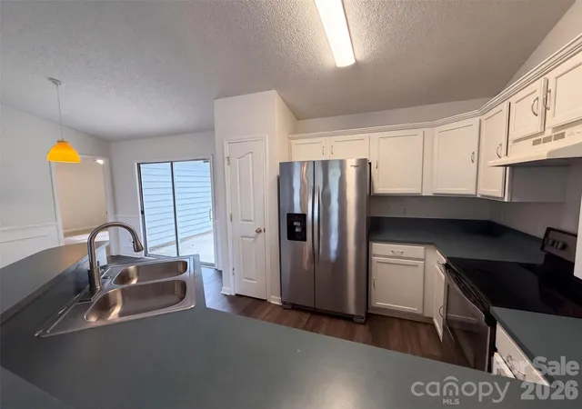 Photo 1 of Single family home for sale at 3105 Passour Ridge Ln, Charlotte, NC 28269 | MLS# 4439546 | Listing updated on 2026-10-30