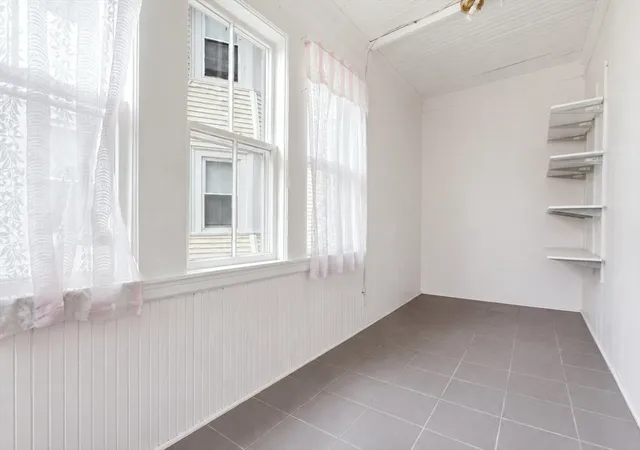 Photo 4 of Single family home for sale at 1 Dayton St, Boston, MA 02124 | MLS# 73568033 | Listing updated on 2026-10-09