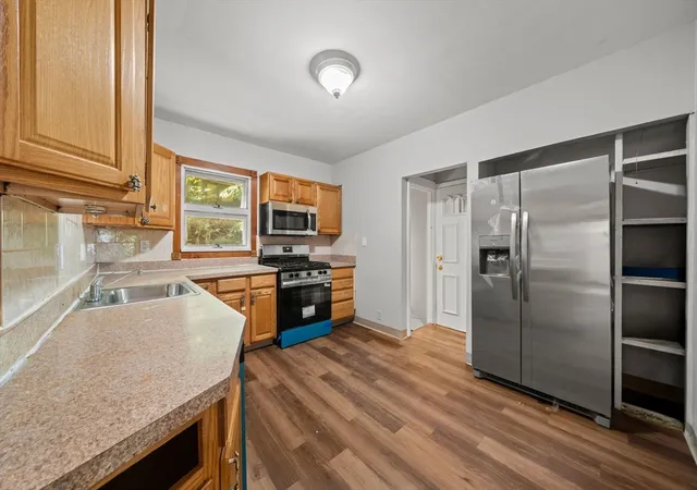 Photo 4 of Multi family home for sale at 391 Poplar St, Roslindale, MA 02131 | MLS# 73551319 | Listing updated on 2026-08-06