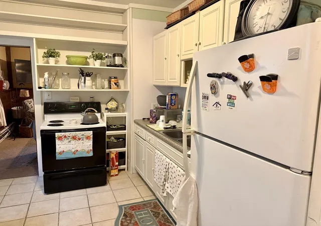 Photo 4 of House for sale at 92 Walnut St, Clinton, MA 01510 | MLS# 73560578 | Listing updated on 2026-09-22
