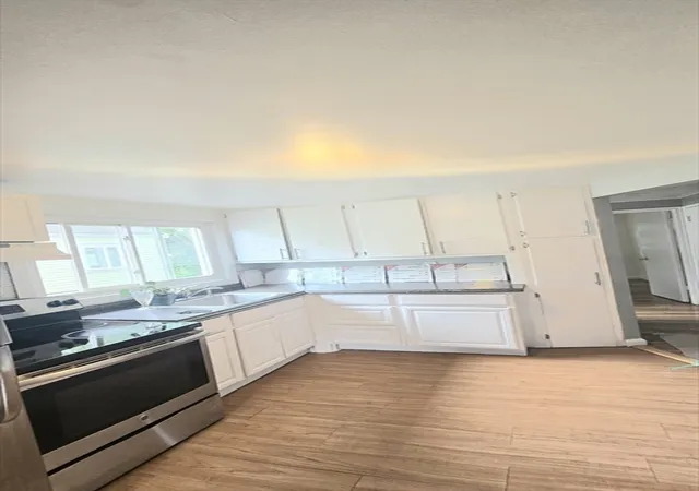 Photo 5 of Multi family home for sale at 11 Stow Rd, Mattapan, MA 02126 | MLS# 73553419 | Listing updated on 2026-08-17