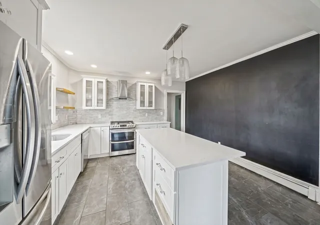 Photo 3 of Single family home for sale at 91 Elm St, Quincy, MA 02169 | MLS# 73560459 | Listing updated on 2026-10-05