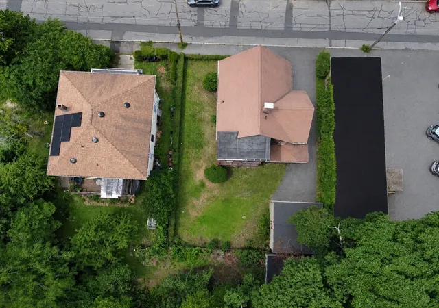 Photo 3 of Multi family home for sale at 233 Arlington St, Medford, MA 02155 | MLS# 73555449 | Listing updated on 2026-08-15
