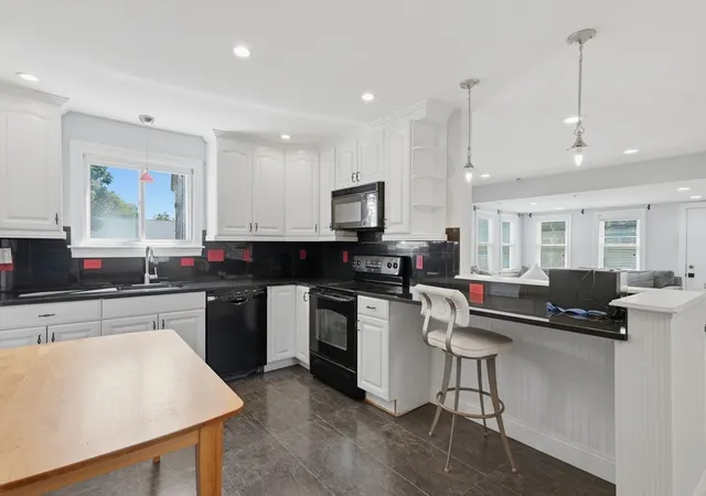 Photo 3 of Single family home for sale at 112 Stoughton St, Quincy, MA 02169 | MLS# 73565026 | Listing updated on 2026-09-26