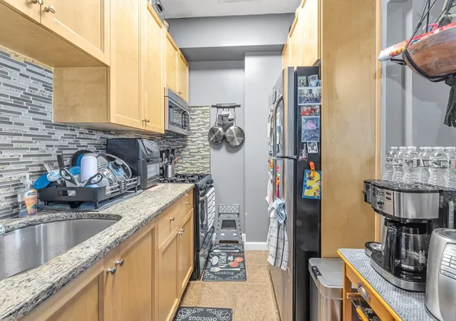 Photo 3 of Multi family home for sale at 90 Blue Hl Ave, Roxbury, MA 02119 | MLS# 73538902 | Listing updated on 2026-09-14