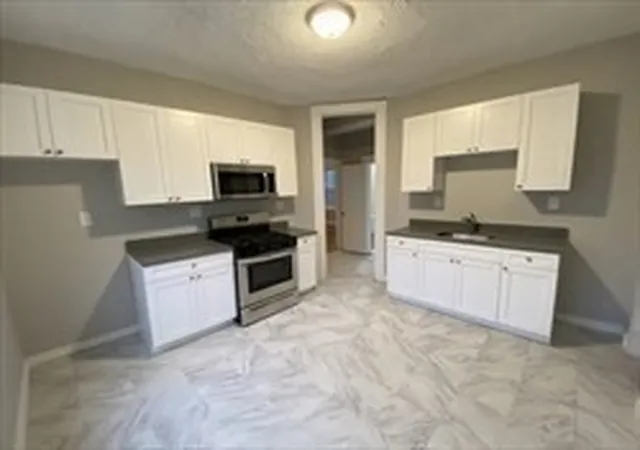 Photo 2 of Multi family home for sale at 136 138 Greenwood, Boston, MA 02121 | MLS# 73568648 | Listing updated on 2026-09-14