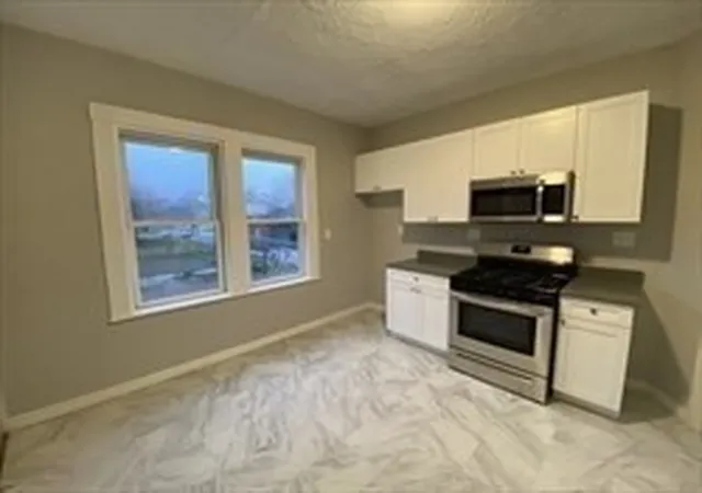 Photo 3 of House for sale at 136-138 Greenwood, Boston, MA 02121 | MLS# 73568648 | Listing updated on 2026-09-14