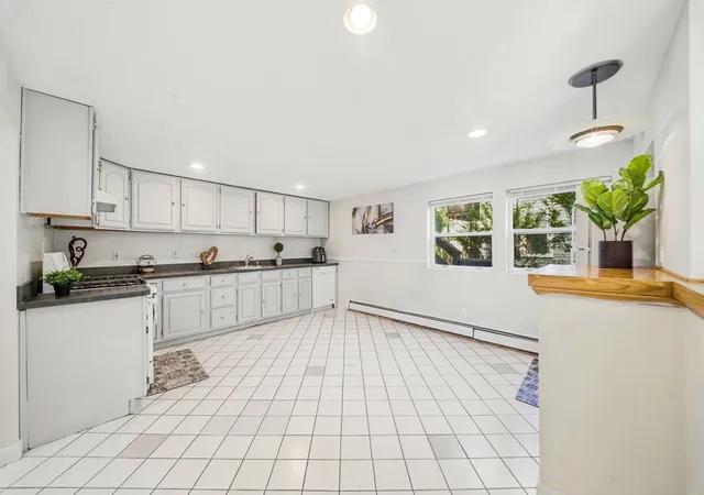 Photo 1 of Multi family home for sale at 14-16 Moore St, Quincy, MA 02169 | MLS# 73569399 | Listing updated on 2026-09-17