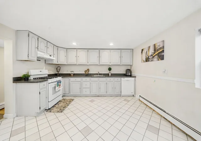 Photo 3 of Multi family home for sale at 14-16 Moore St, Quincy, MA 02169 | MLS# 73569399 | Listing updated on 2026-09-17