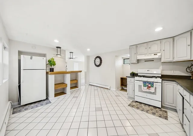 Photo 4 of Multi family home for sale at 14-16 Moore St, Quincy, MA 02169 | MLS# 73569399 | Listing updated on 2026-09-17