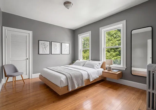 Photo 3 of Multi family home for sale at 12 Douglas Ave, Somerville, MA 02145 | MLS# 73541807 | Listing updated on 2026-09-12