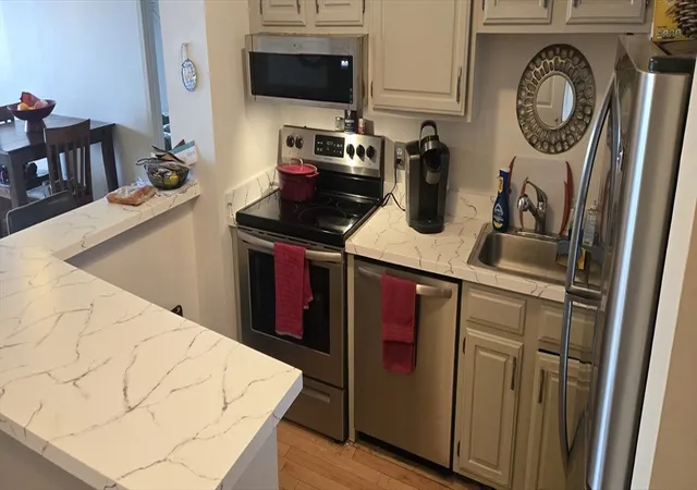 1st image of 4975 Washington St #310, West Roxbury, MA 02132 | MLS# 73563773