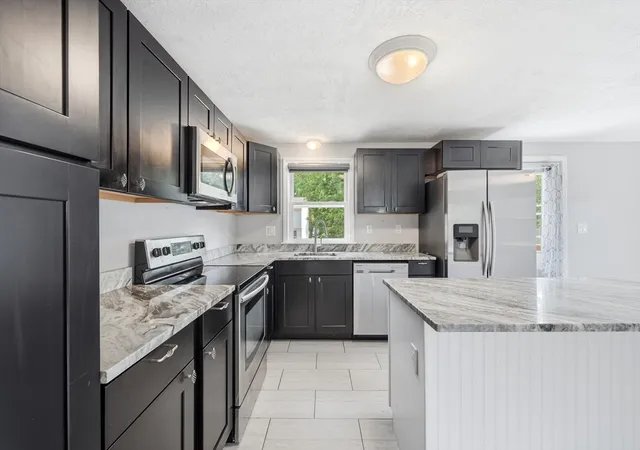 Photo 2 of Single family home for sale at 51 Broad Street, Billerica, MA 01821 | MLS# 73568998 | Listing updated on 2026-09-15