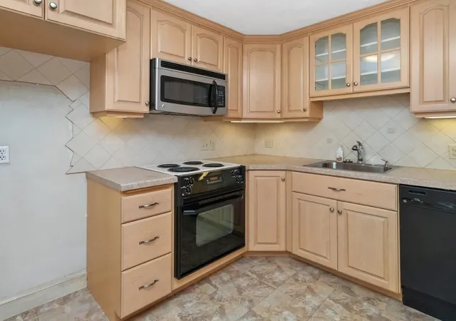 Photo 3 of Condo for sale at 40 Whitman Rd #B-2, Waltham, MA 02453 | MLS# 73562398 | Listing updated on 2026-09-12