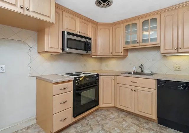 Photo 3 of Condo for sale at 40 Whitman Rd #B-2, Waltham, MA 02453 | MLS# 73562398 | Listing updated on 2026-09-12
