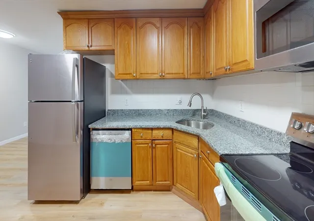 Photo 2 of Condominium at 12 Woodland St #38, Everett, MA 02149 | MLS# 73420865 | | Sold on 2025-09-30