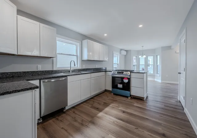 5th image of 46 Lyons St, Lowell, MA 01852 | MLS# 73377287
