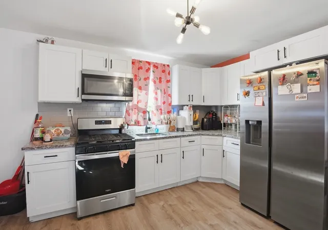 4th image of 28 Warnock Street, Lowell, MA 01852 | MLS# 73485180