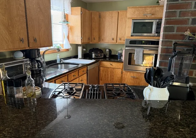 Photo 4 of Multi family home for sale at 61 Butterfield St, Lowell, MA 01854 | MLS# 73568793 | Listing updated on 2026-10-11
