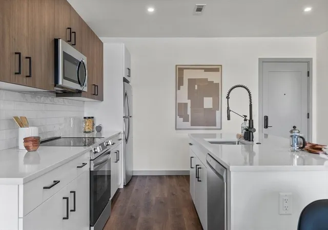 Photo 3 of Condo for sale at 203 Lowell St #2, Wilmington, MA 01887 | MLS# 73468417 | Listing updated on 2026-02-17