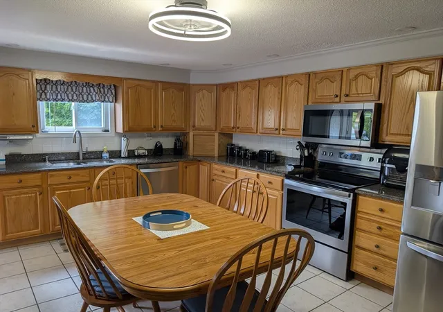 Photo 3 of Multi family home for sale at 50 Ash St, Gardner, MA 01440 | MLS# 73556536 | Listing updated on 2026-08-02