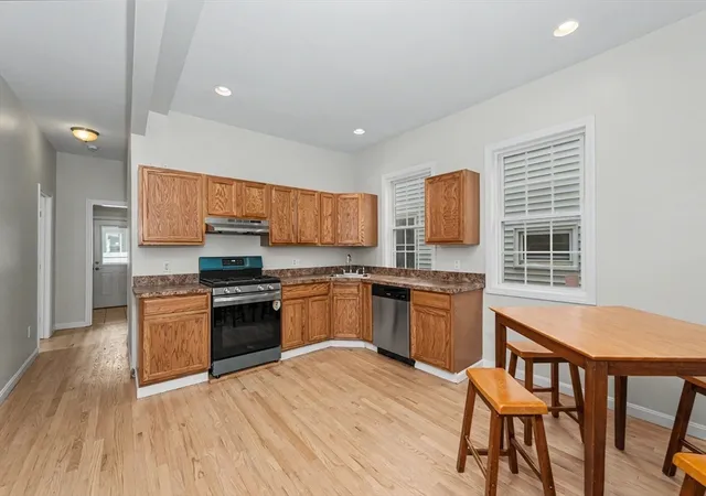 Listing Photo 1 - Condo for sale in building located at 55 4th St, Lowell, MA 01850 - Unit #57