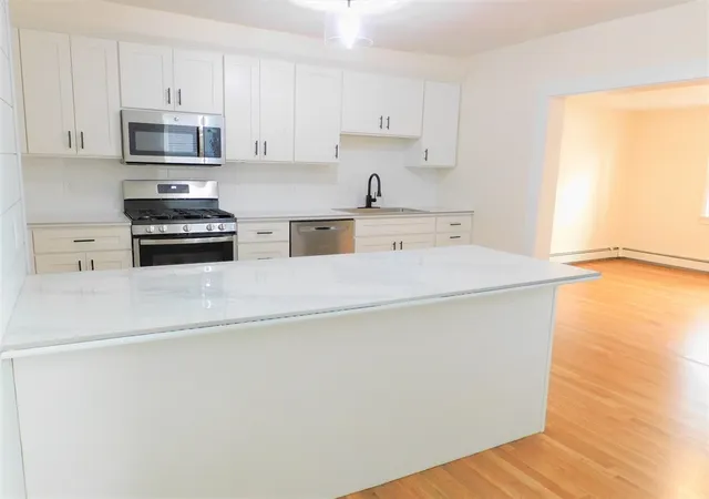 Photo 2 of Single family home for sale at 30 Jenkins St, South Boston, MA 02127 | MLS# 73561847 | Listing updated on 2026-08-15