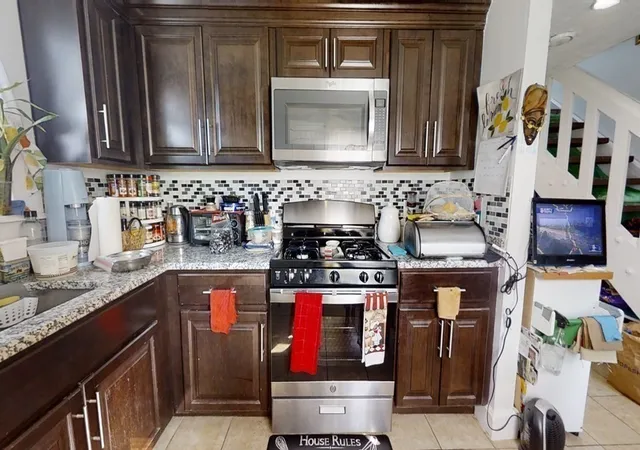 Photo 3 of Multi family home for sale at 46 1/2 Essex St, Salem, MA 01970 | MLS# 73544671 | Listing updated on 2026-09-13