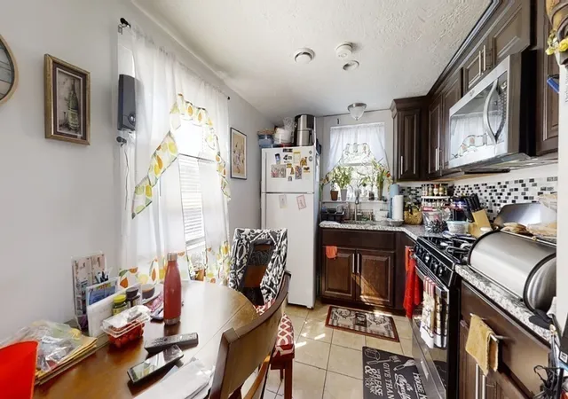 Photo 4 of Multi family home for sale at 46 1/2 Essex St, Salem, MA 01970 | MLS# 73544671 | Listing updated on 2026-09-13