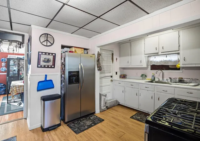 Photo 3 of Sale Pending at 27 Rowe St, Roslindale, MA 02131 | MLS# 73326443 | Listing updated on 2026-06-16