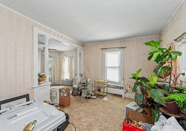 Photo 4 of Single family home for sale at 133 Crawford St, Lowell, MA 01854 | MLS# 73569183 | Listing updated on 2026-10-05