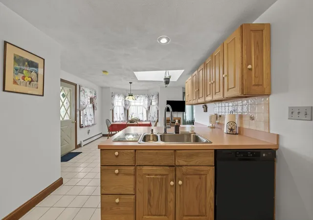 Photo 3 of Single family home for sale at 52 Wyman St, Woburn, MA 01801 | MLS# 73556616 | Listing updated on 2026-09-18
