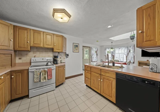 Photo 3 of Single family home for sale at 52 Wyman St, Woburn, MA 01801 | MLS# 73556616 | Listing updated on 2026-09-18