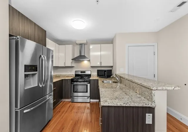 Photo 3 of Condo for sale at 244 Main St #1, Medford, MA 02155 | MLS# 73565012 | Listing updated on 2026-08-22