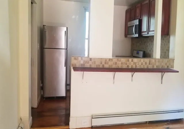 Photo 5 of Multi family home for sale at 36 Gordon St, Allston, MA 02134 | MLS# 73565314 | Listing updated on 2026-08-23