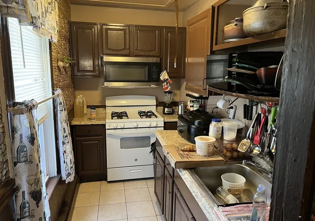 Photo 4 of Multi family home for sale at 52 Ashley St, New Bedford, MA 02744 | MLS# 73523734 | Listing updated on 2026-06-02
