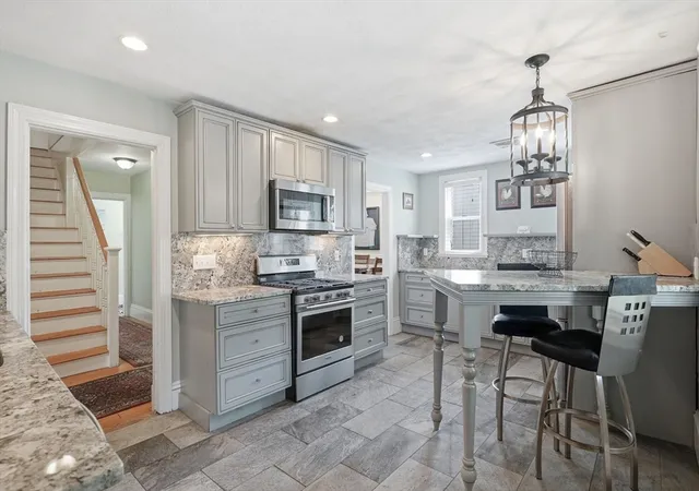 Photo 4 of Sale Pending at 12-14 Newcastle Rd, Brighton, MA 02135 | MLS# 73545464 | Listing updated on 2026-09-19
