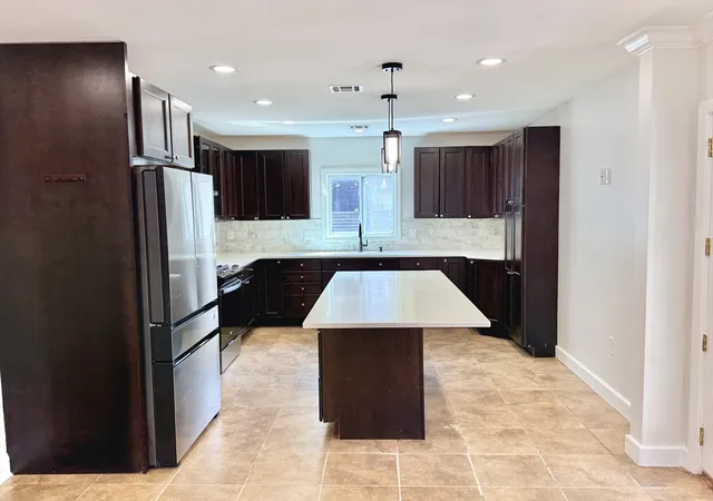 Photo 5 of Single family home for sale at 102 Pierce St, Hyde Park, MA 02136 | MLS# 73549866 | Listing updated on 2026-08-29