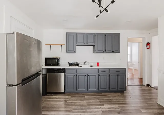 Photo 3 of Multi family home for sale at 15 Mclellan St, Boston, MA 02121 | MLS# 73567663 | Listing updated on 2026-09-16