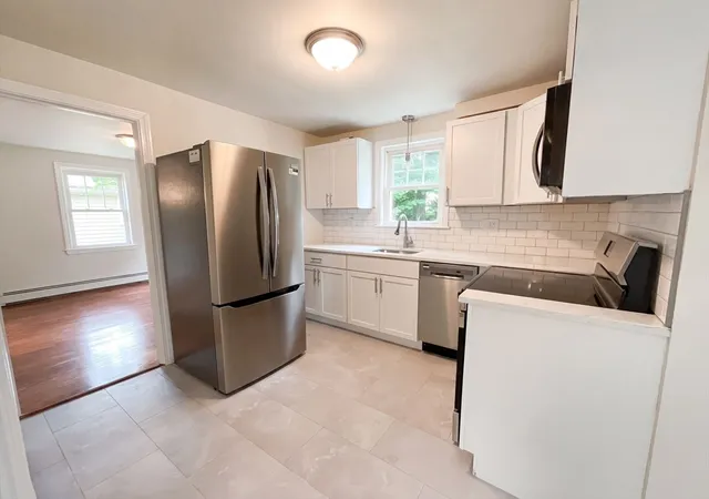 Photo 3 of Single family home for sale at 48 Woodlawn St, Randolph, MA 02368 | MLS# 73557023 | Listing updated on 2026-09-20